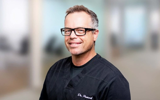 Dr. Ron M. French looking very happy