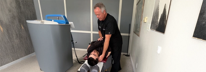 Chiropractor Ventura CA Ron M. French neckpain Hero Dr. Ron M. French doing chiropractic care in male patient