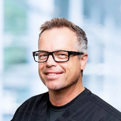 Dr. Ron M. French smiling